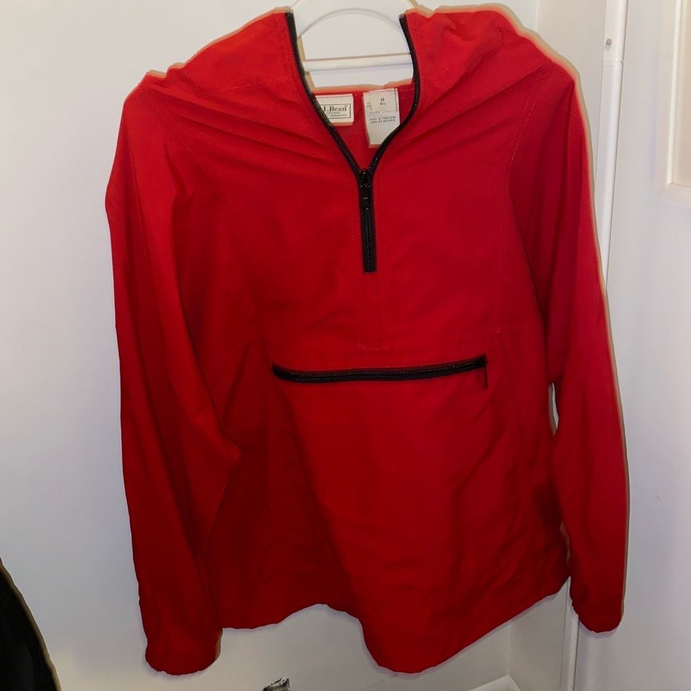 zipper on big pocket and quarter zip neck are black
hidden pocket; vintage